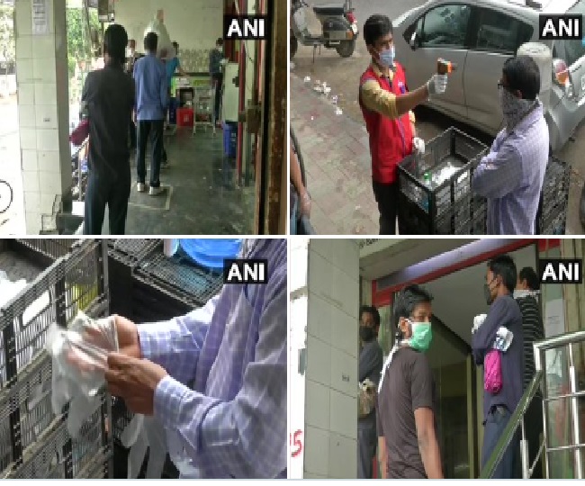दक्षिण दिल्ली में रिलायंस शॉप पर ग्राहकों का तामपान और मॉस्क चेक किया गया