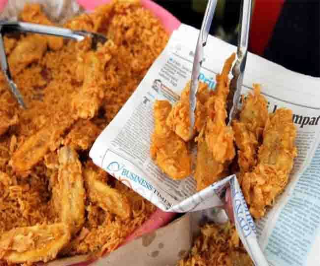 अखबार पर खाना रखकर खाने वाले हो जाये सावधान, हो सकती है ये घातक बीमारी