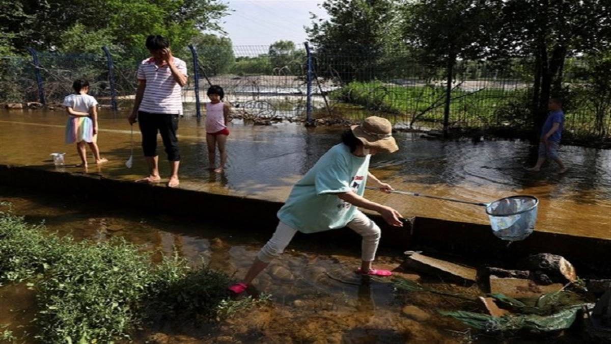 Flood in China: भारी बारिश और बाढ़ से बेहाल हुआ चीन, जियांग्शी इलाके के 8 लाख से अधिक निवासियों को किया प्रभावित
