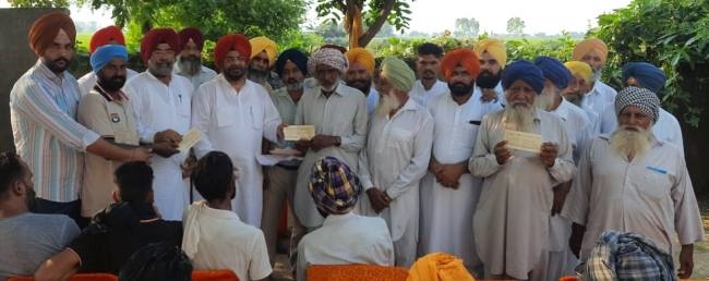 नागरा ने 247 किसानों व खेत मजदूरों को कर्ज मुक्ति के चेक बांटे