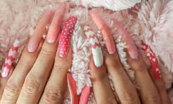 Simone Taylor last cut her nails in 2014 and they are now nearly six inches long Simone Taylor last cut her nails in 2014 and they are now nearly six inches long