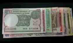 Guess the total amount from the picture given below Guess the total amount from the picture given below
