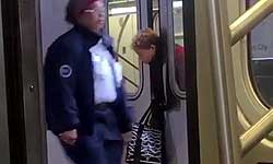 Viral video of a woman whose neck trapped in door of Newyork Subway train but one helps Viral video of a woman whose neck trapped in door of Newyork Subway train but one helps