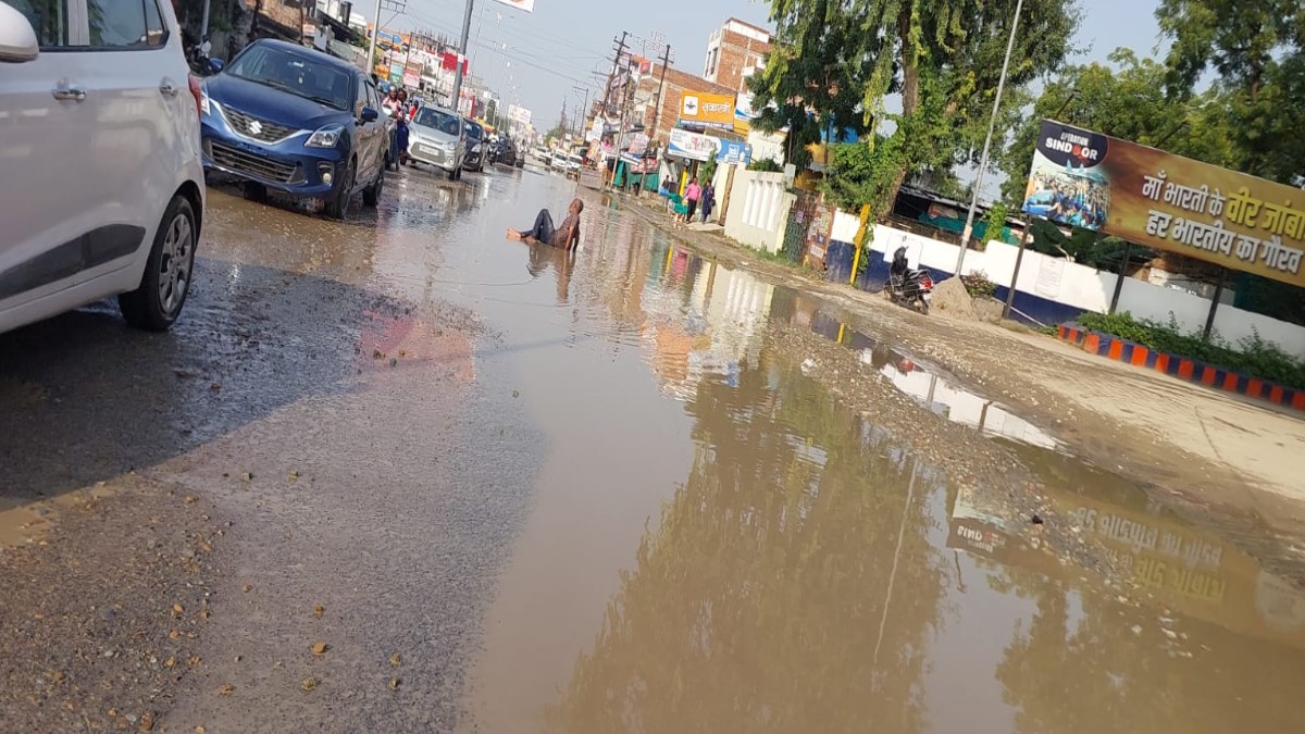 varanasi pwd failure potholes filled with water after 10 days