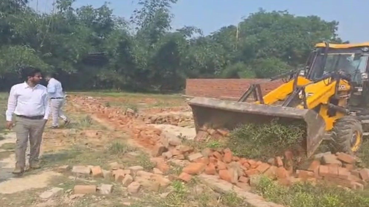 varanasi vda demolishes illegal plotting in aura sikaroul ward