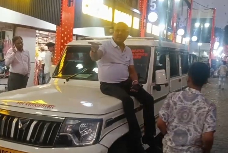 gorakhpur official rides hood fines 77 for illegal parking