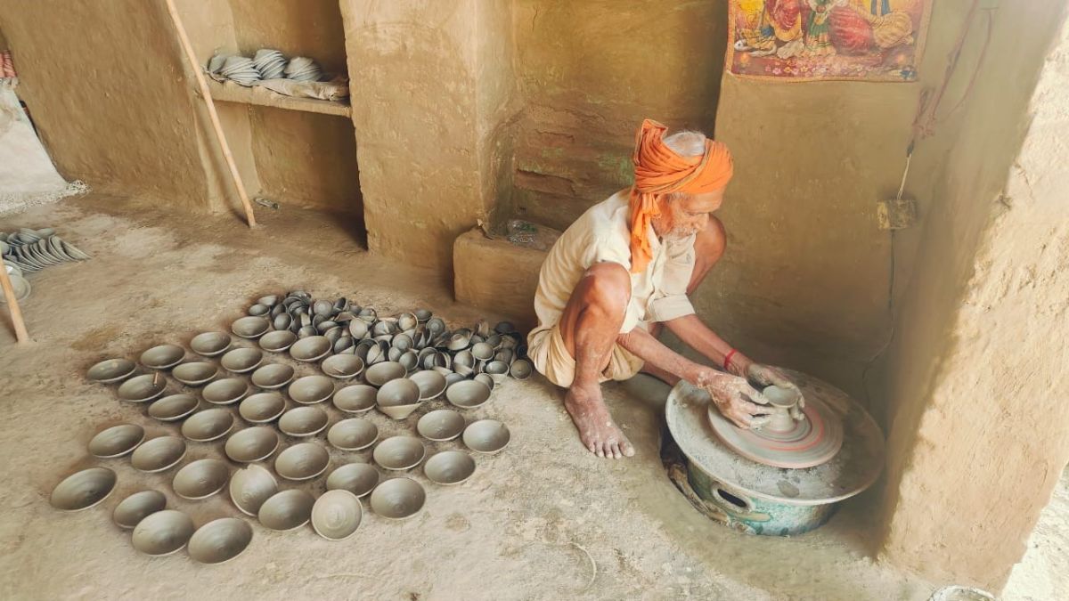mahadev prajapati keeps tradition alive by making earthen lamps for diwali