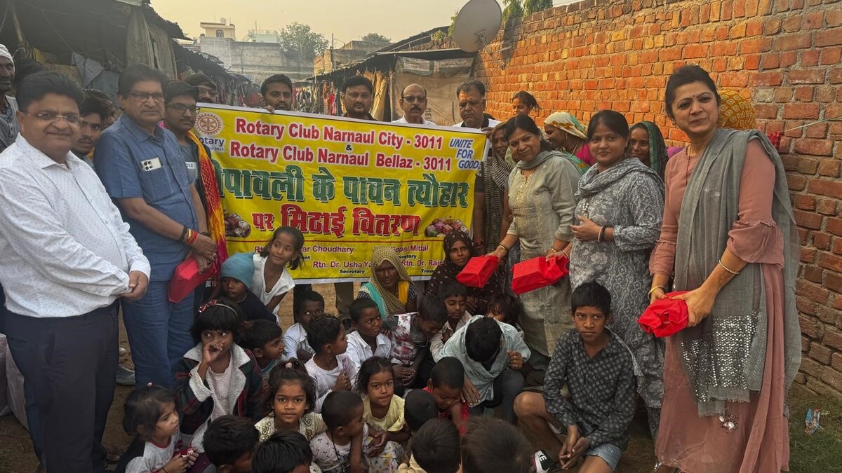 rotary club distributes sweets and candles in slums on choti diwali