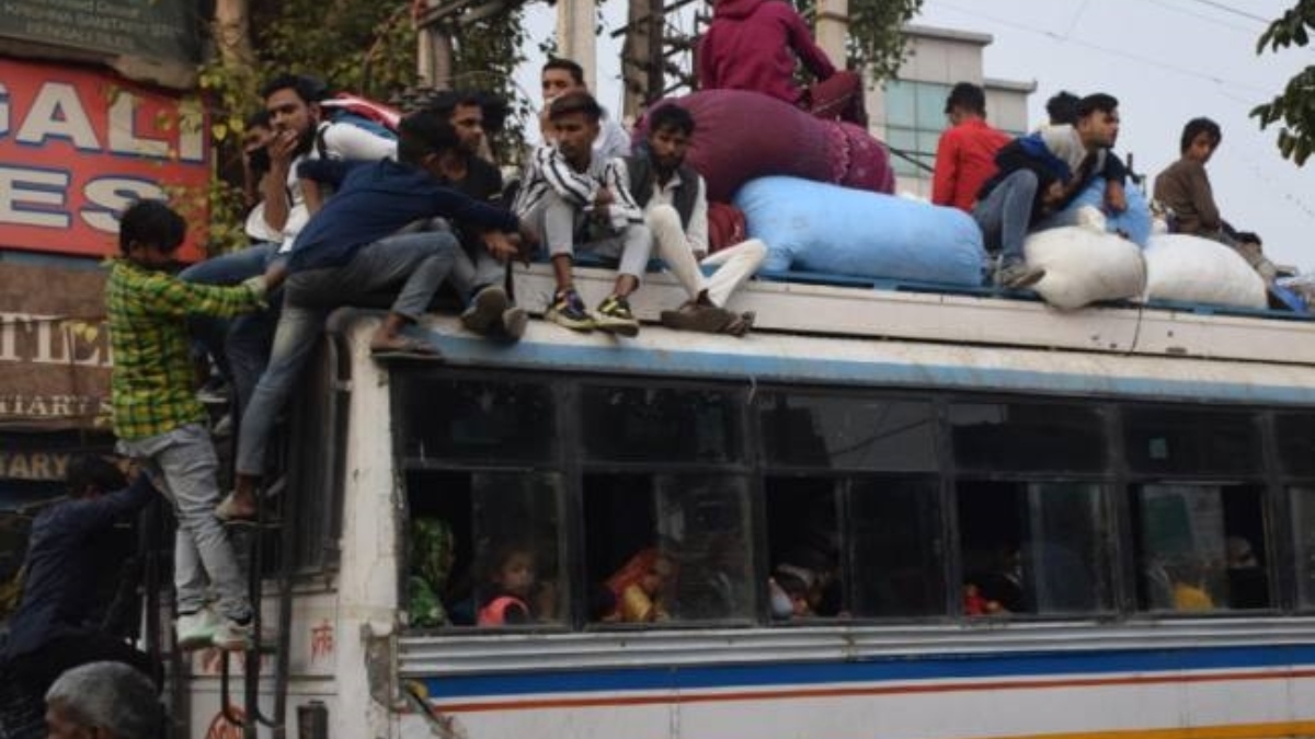 diwali rush passengers travel on bus roofs amidst holiday crowd