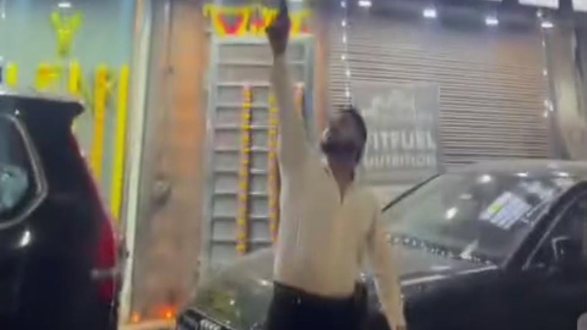 shopkeeper brandishes gun on facebook police investigation