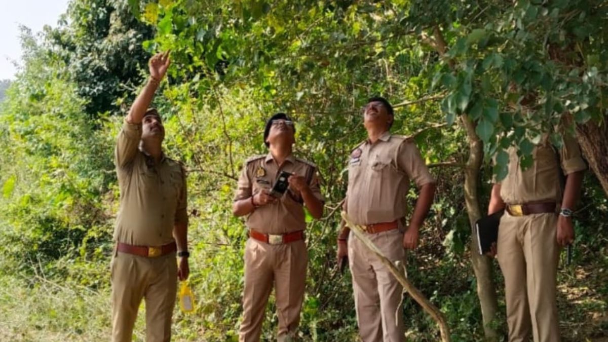 youth body found hanging near river in maharajganj investigation underway