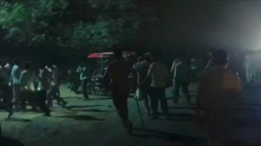 police lathi charge after womans body blockade