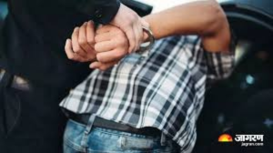 car driver arrested for ramming police barricade