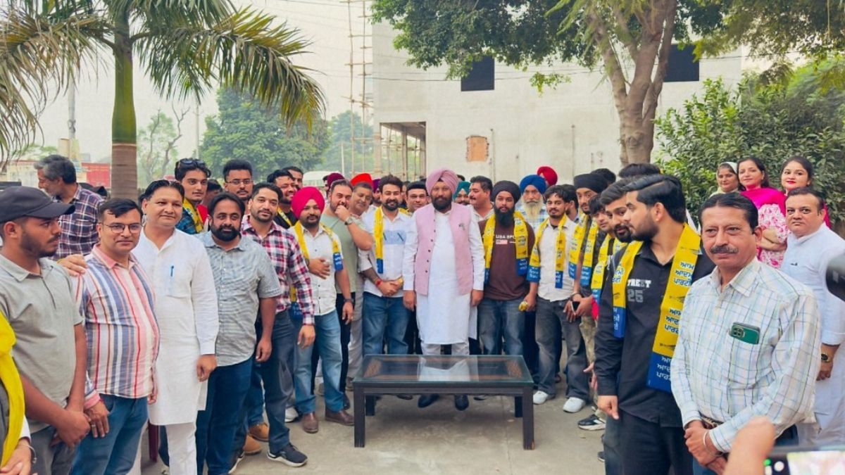 bjp suffers major setback in jalandhar as several leaders join aam aadmi party mla balkar singh welcomes them