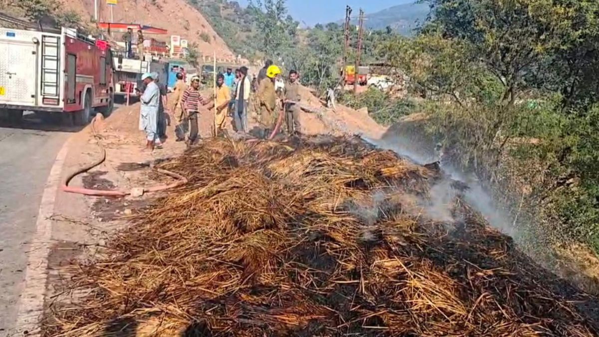 a massive fire broke out in stubble piled up on the side of the highway in udhampur and firefighters put it out with great effort