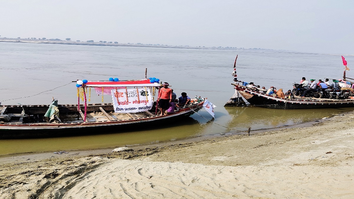 reaching voters in hardaspur village a booth across the ganga is a challenge