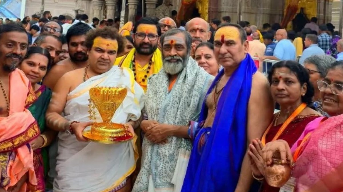 a golden snake is dedicated to baba darbar giving devotees a new experience