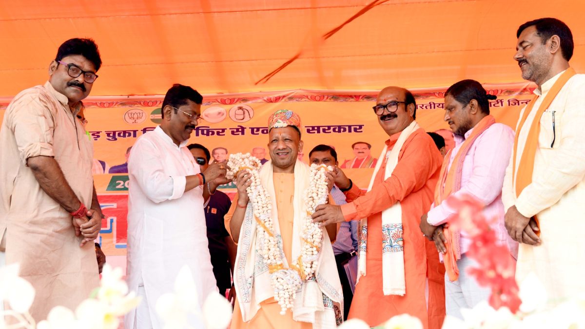 yogi slams congressrjd they want burqa not development