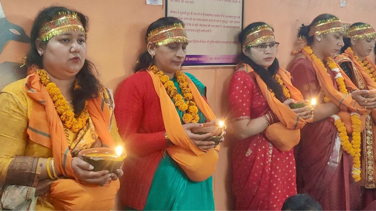 couples participate in khada diya ritual for childbirth in kamleshwar mahadev temple