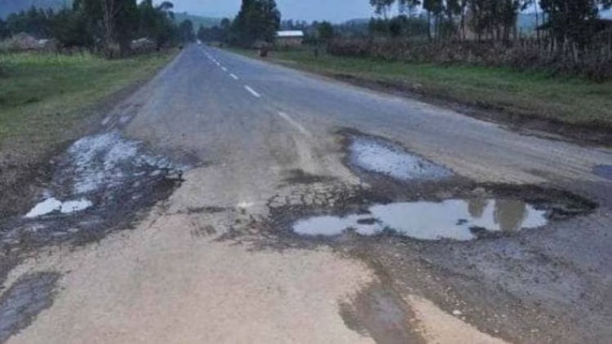 dilapidated road to maharajgarhi deep pits caused by dump trucks