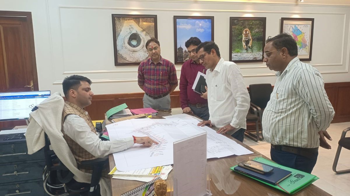 three lane overbridge will be built at railway crossing that has become an obstacle to the four lane road in lakhimpur