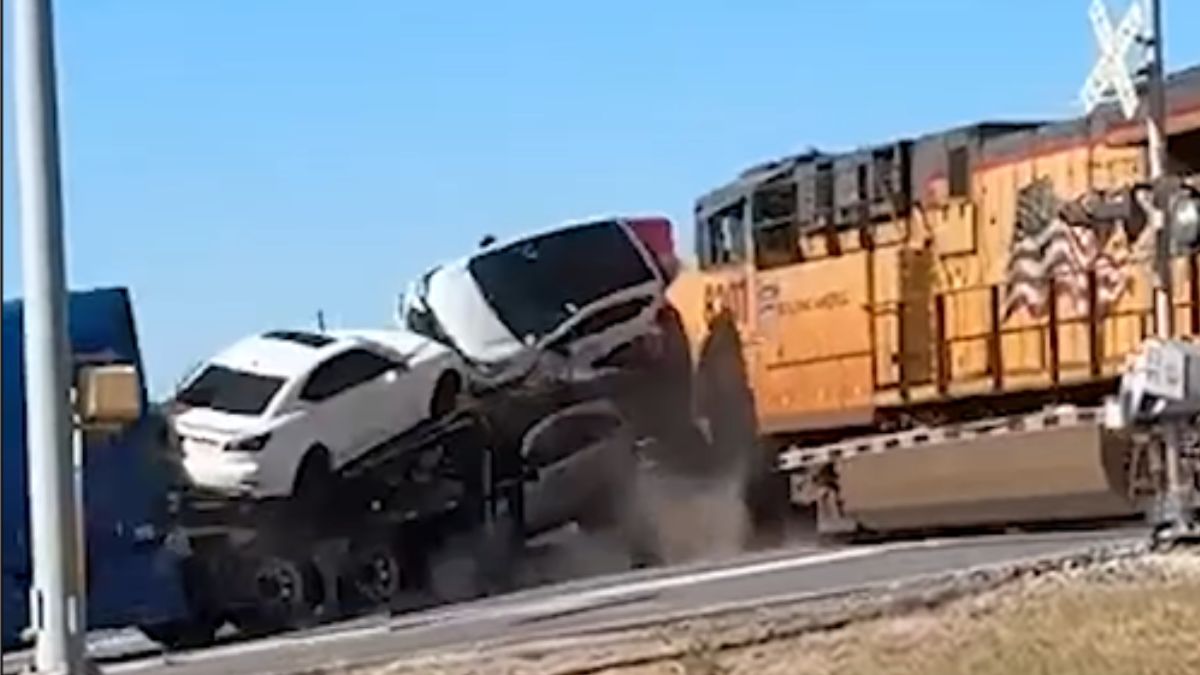 train hits semitrailer in texas luxury cars scattered
