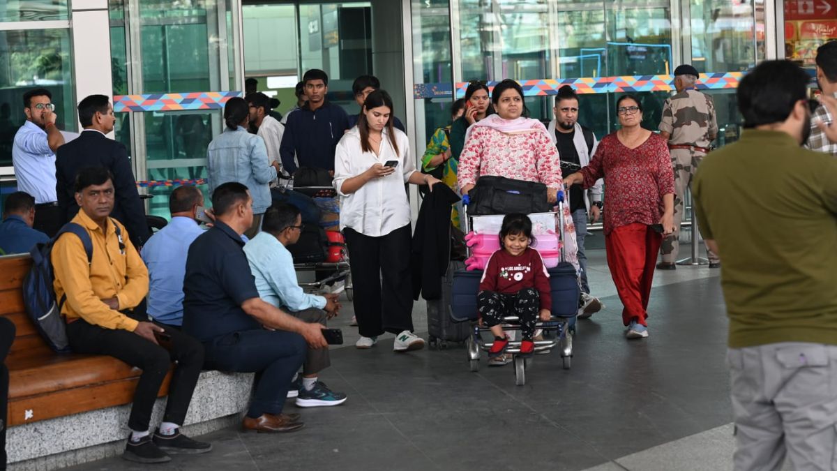 delhi airport technical issue flight delays automation failure