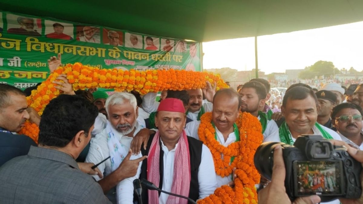 bihar election 2025 akhilesh yadav claims bjp job snatcher promises laptops for youth