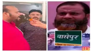 हाई कोर्ट के निर्देश के बाद मिठाई खाते फहीम खान के पुत्र इकबाल खान।