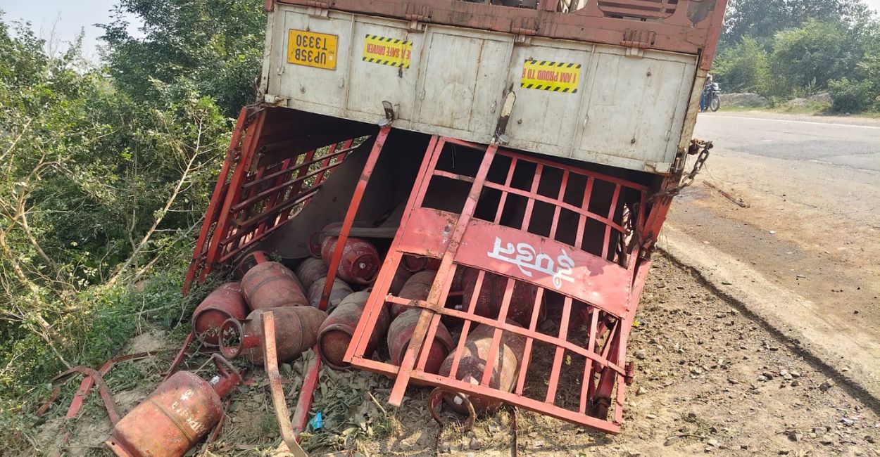 unnao truck accident drunk driver causes gas cylinder truck to overturn