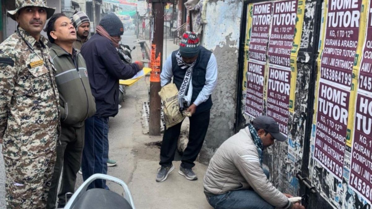 action taken against big property tax defaulters buildings sealed aligarh latest news