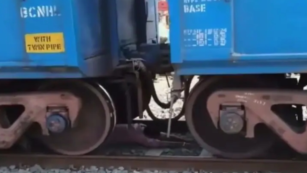 telangana man survives train accident viral video of risky stunt