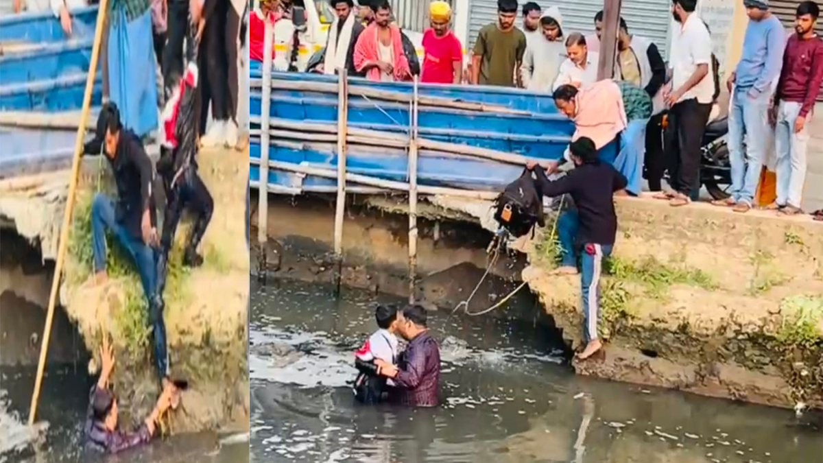 patna father jumps into drain to save child both rescued