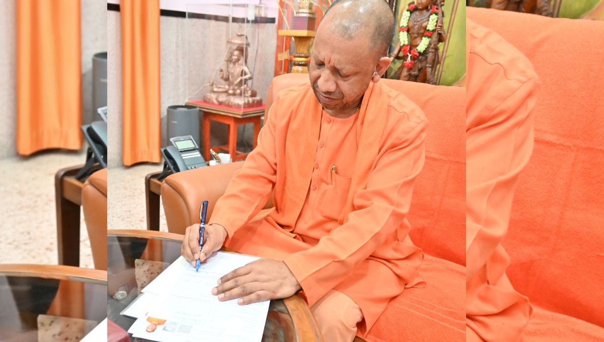 cm yogi fills voter list form in gorakhpur uttar pradesh elections