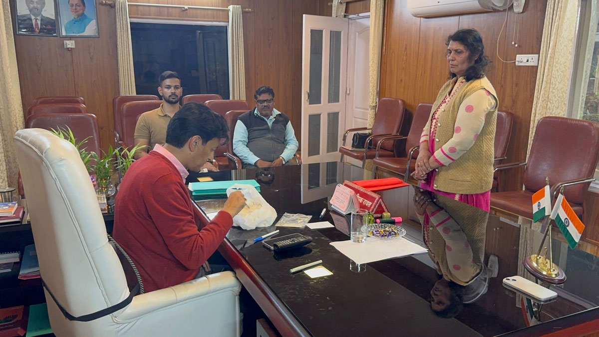 woman approaches kumaon commissioner with spoiled flour