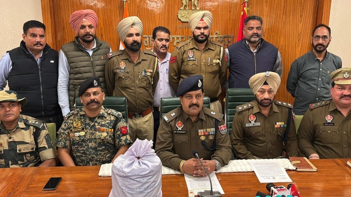 two youths arrested for smuggling heroin from pakistan they were working in a liquor contractor raid party