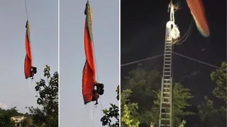 धर्मशाला में बिजली के तारों में पैराग्लाइडर उलझने से फंसे दो लोग।