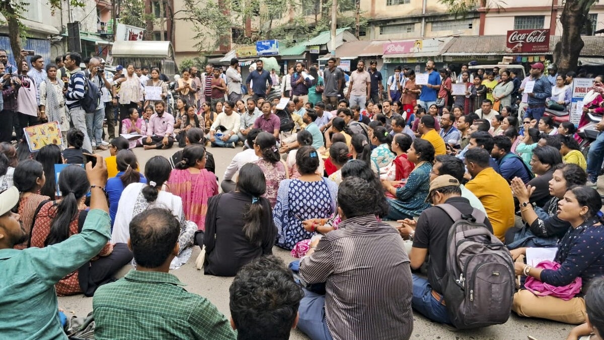kolkata teacher protests over biased marking recruitment delays