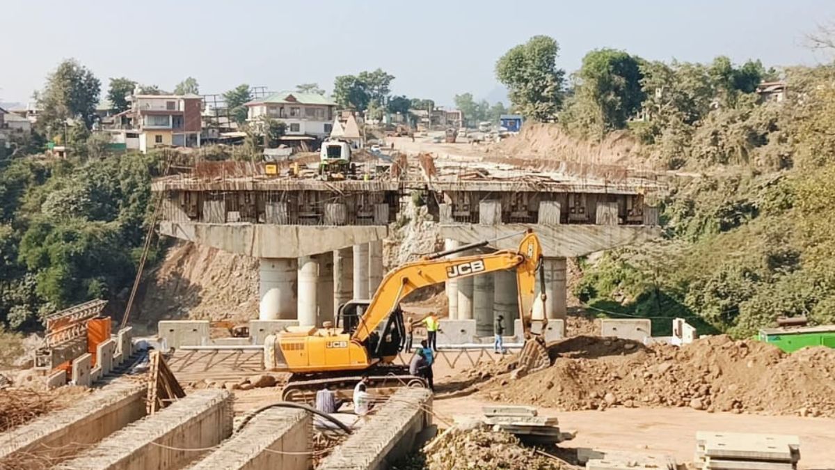 kangra news laborer falls from underconstruction bridge into khouli khad
