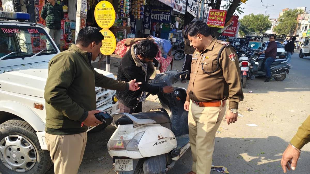 sirsa police crackdown action against triple riding speeding and no helmet violators
