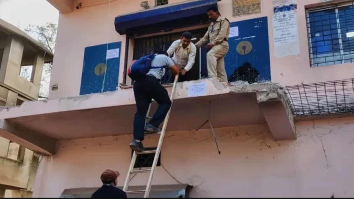 sbi branch access blocked customers climb ladder after demolition drive