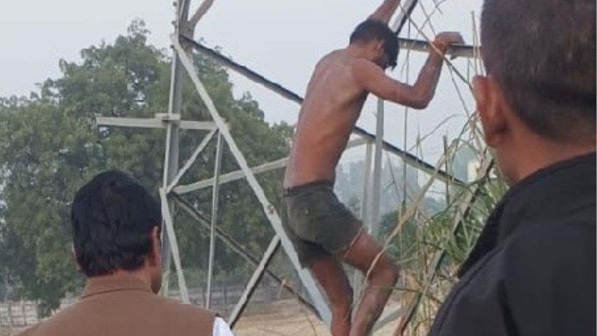 kanpur drunk man drama climbs 150ft hightension pole