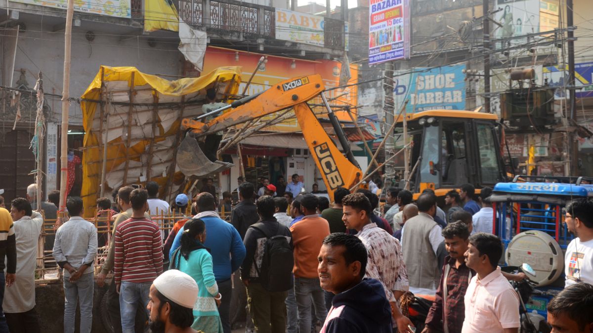 bulldozers remove shops in gaya under bihar anti encroachment drive