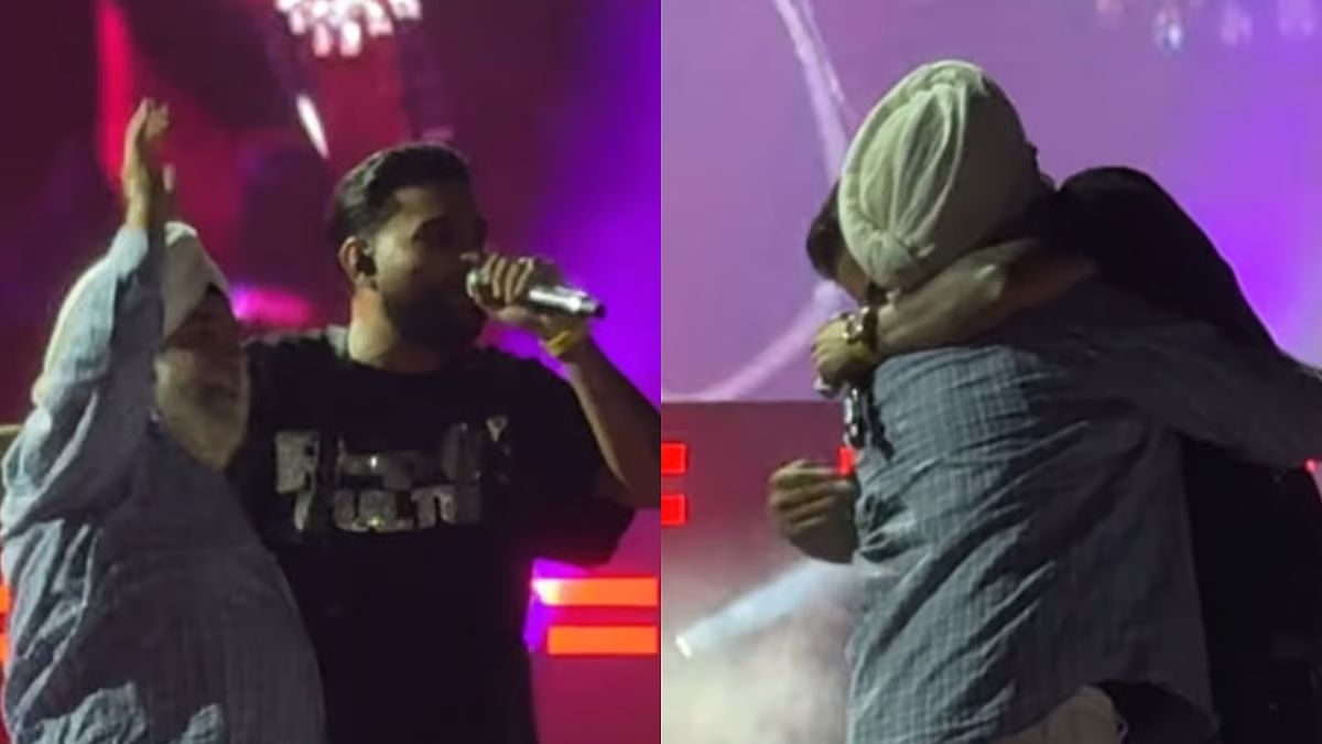 karan aujla abu dhabi concert elderly fan reaches stage singer hugs him