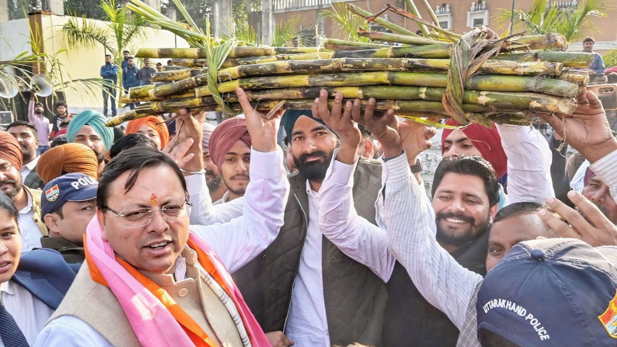 farmers honor cm dhami with kisan putratitle for higher sugarcane price