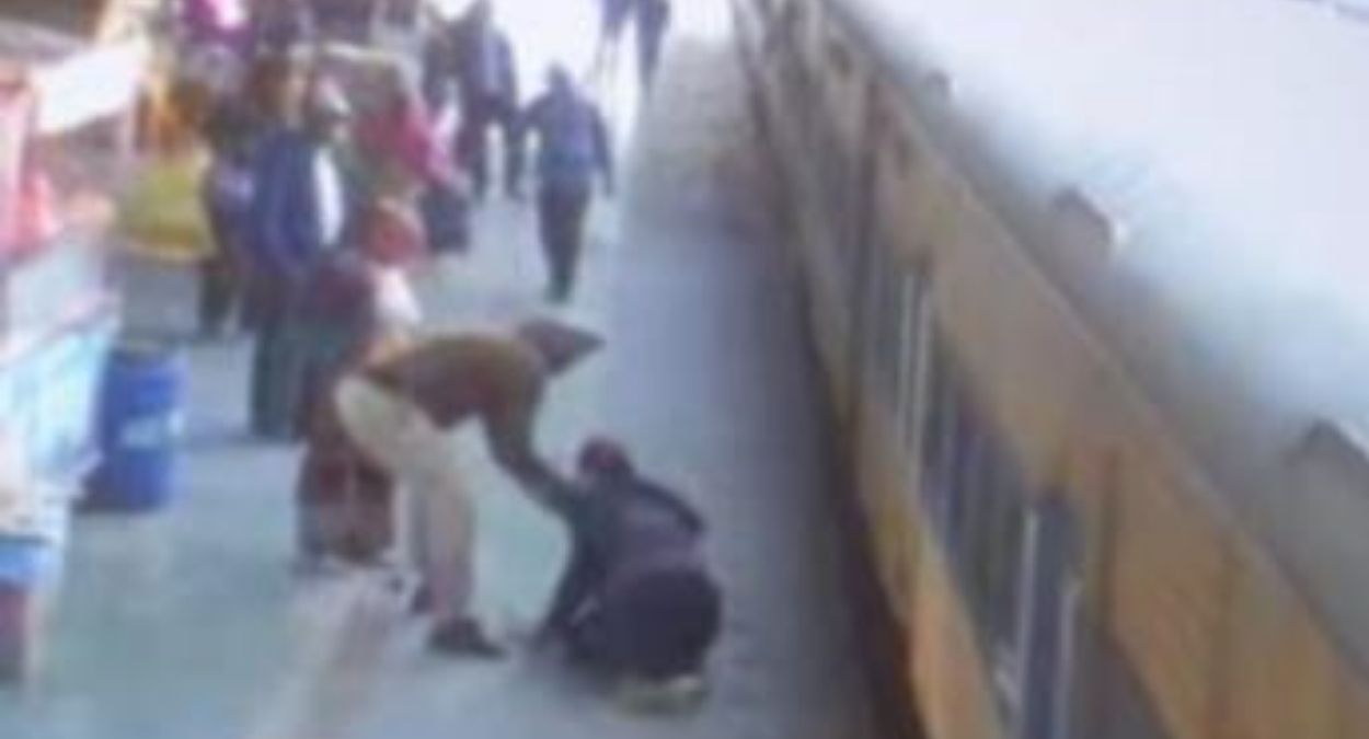 grp constable saves woman from train accident at panipat station