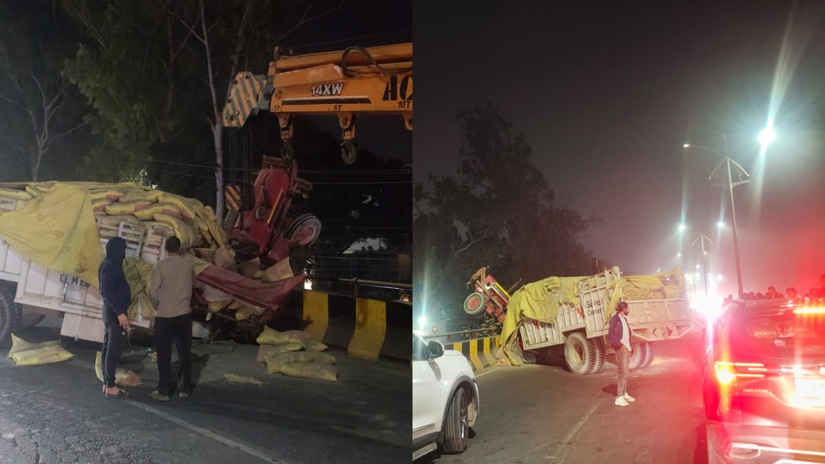 ghaziabad tractor dangles from rob railing after tire burst driver injured