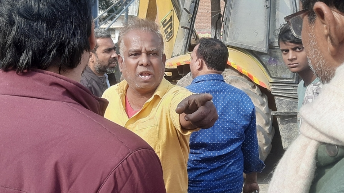 bhojpur news bulldozer action in bihiya sparks uproar over encroachment removal