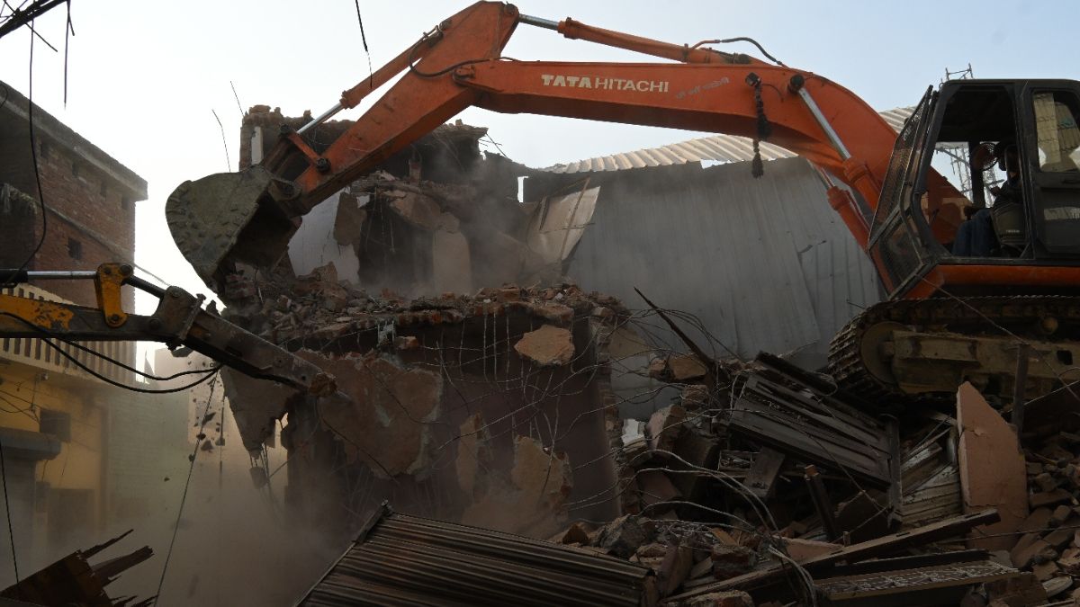 cm yogi bareilly visit bulldozer action rioters illegal properties demolished denting painting
