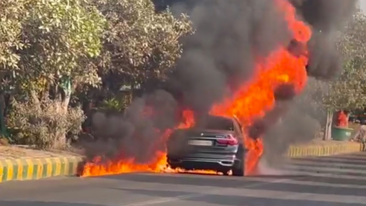 bmw car fire in noida driver escapes unhurt